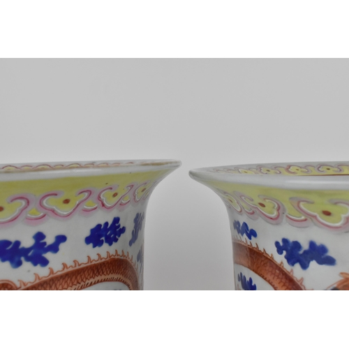 140 - A near pair of Chinese 20th century cylinder jardinières with flared rims and straight sides, decora... 