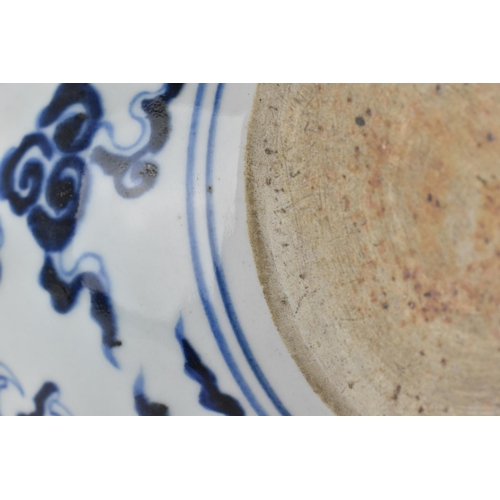 143 - A Chinese 20th century blue and white tianqiuping vase decorated with a dragon and clouds, 28cm h
Co... 