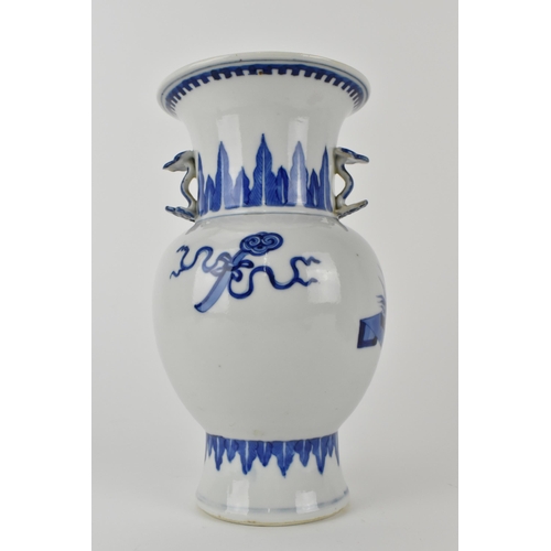 144 - A Chinese 20th century blue and white Gu vase with a lapet leaf band, and an interior scene with an ... 