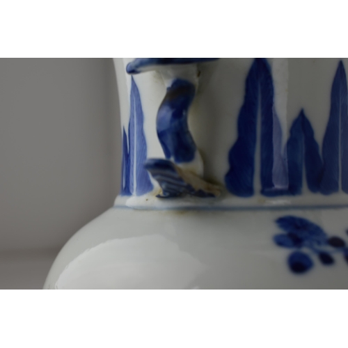 144 - A Chinese 20th century blue and white Gu vase with a lapet leaf band, and an interior scene with an ... 