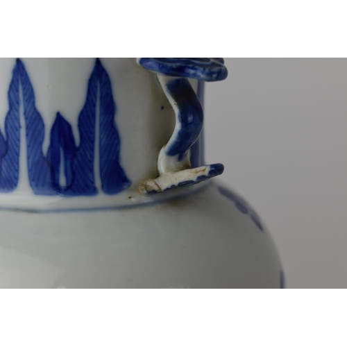 144 - A Chinese 20th century blue and white Gu vase with a lapet leaf band, and an interior scene with an ... 