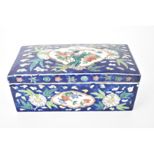 146 - A Chinese late Qing Dynasty porcelain brush box, 19th century, with a domed cover and straight sides... 