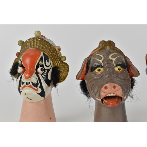 149 - Five Chinese 20th century ceramic finger puppets fashioned as Noh masks with painted features, masks... 