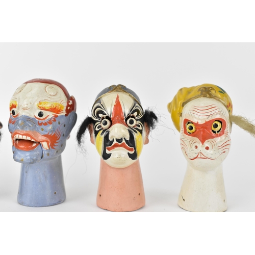 149 - Five Chinese 20th century ceramic finger puppets fashioned as Noh masks with painted features, masks... 