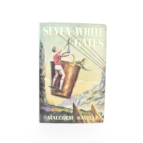 163 - A first edition Seven White Gates book by Malcolm Saville having red boards, black titling including... 