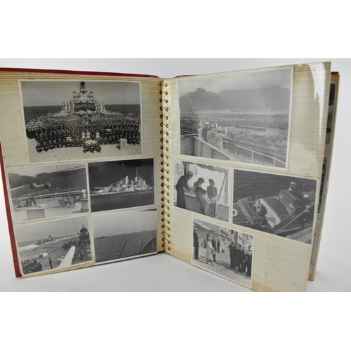 206 - A photo album containing 1940s photographs of King George VI, Queen Elizabeth, Princess Elizabeth an... 