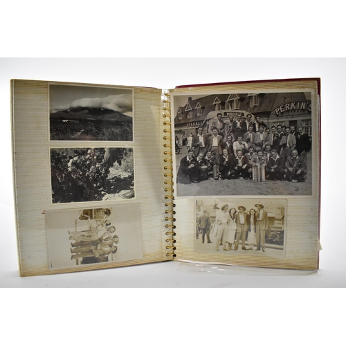 206 - A photo album containing 1940s photographs of King George VI, Queen Elizabeth, Princess Elizabeth an... 