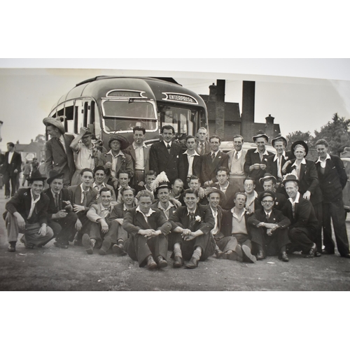 206 - A photo album containing 1940s photographs of King George VI, Queen Elizabeth, Princess Elizabeth an... 