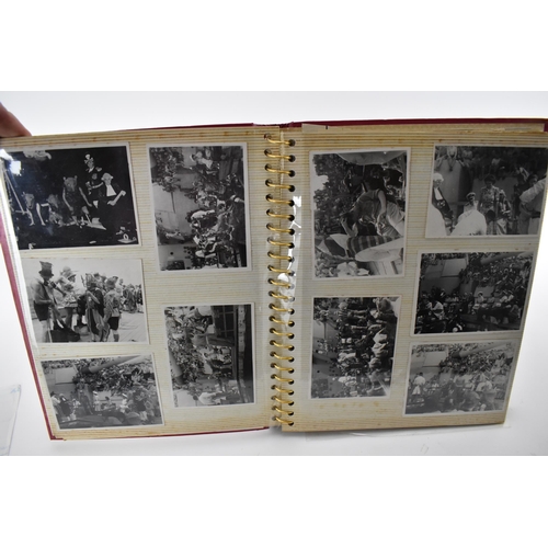 206 - A photo album containing 1940s photographs of King George VI, Queen Elizabeth, Princess Elizabeth an... 