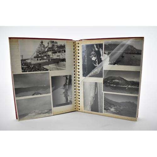 206 - A photo album containing 1940s photographs of King George VI, Queen Elizabeth, Princess Elizabeth an... 