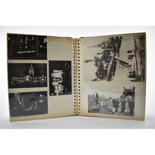 206 - A photo album containing 1940s photographs of King George VI, Queen Elizabeth, Princess Elizabeth an... 