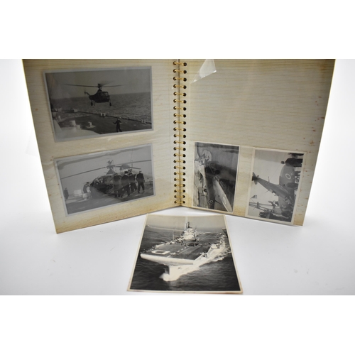 206 - A photo album containing 1940s photographs of King George VI, Queen Elizabeth, Princess Elizabeth an... 