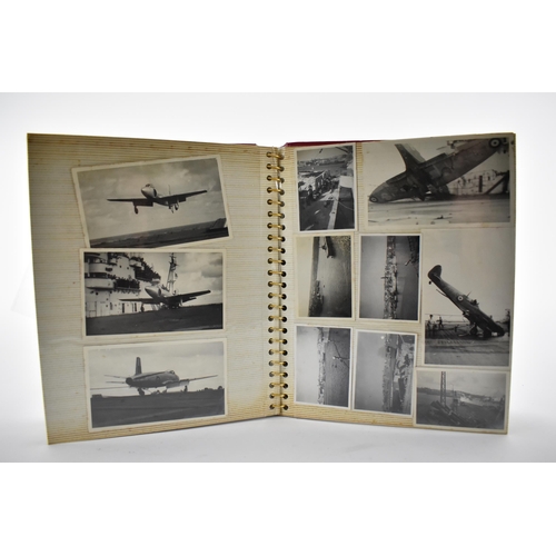 206 - A photo album containing 1940s photographs of King George VI, Queen Elizabeth, Princess Elizabeth an... 