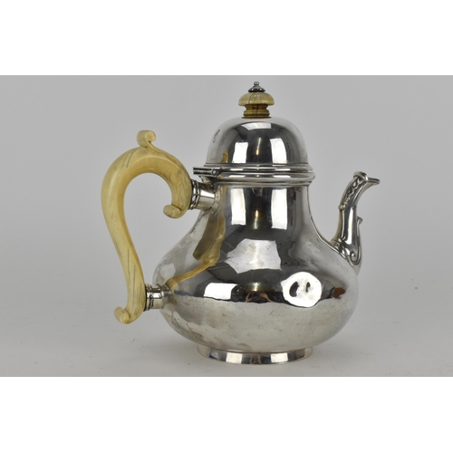 210 - A Victorian London silver teapot by Robert Garrard, dated 1857, with ivory handle and finial, 731g 
... 