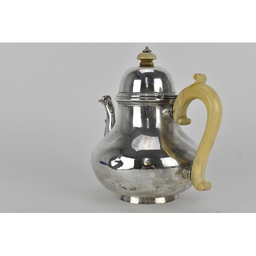 210 - A Victorian London silver teapot by Robert Garrard, dated 1857, with ivory handle and finial, 731g 
... 