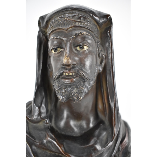 212 - An early 20th century terracotta bust, a Middle Eastern gentleman wearing a Keffiyeh, on a plinth, i... 