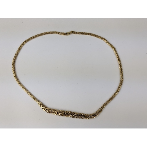 213 - A 9ct gold fancy link necklace stamped 375, 8.7g