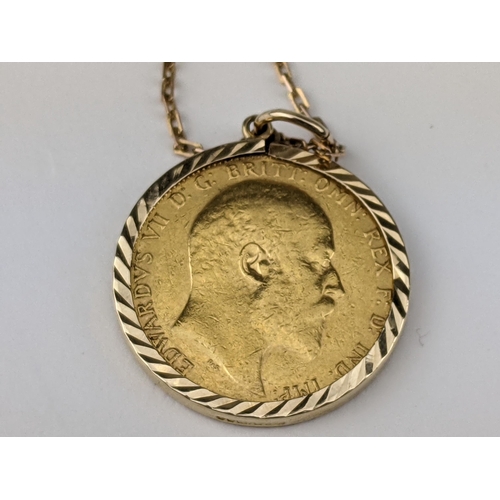 216 - A 1908 full-sovereign with 9ct gold mount and chain, total weight 11.1g