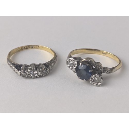 232 - An 18ct gold and platinum diamond and sapphire crossover ring 2.7g, together with an 18ct gold and p... 