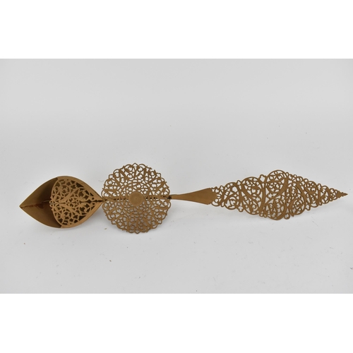 233 - A cased set of four late 19th century Trinidad finely carved and pierced wooden ornamental spoons, w... 