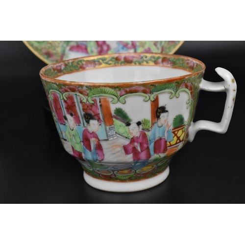 34 - A Chinese late 19th century Canton famille rose tea cup and saucer, with applied polychrome enamel d... 