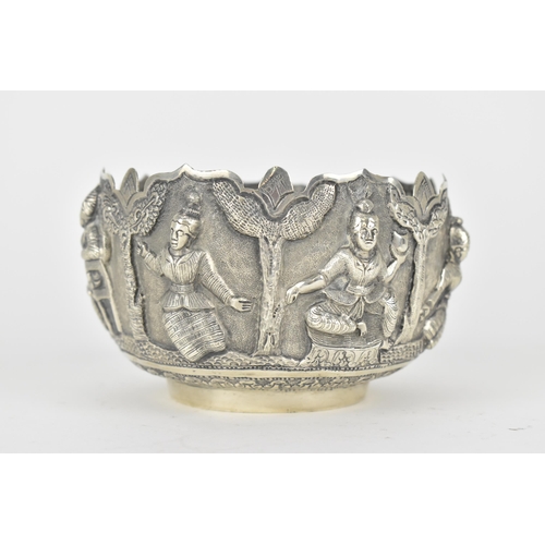 62 - Two early 20th century Indian silver bowls, the larger one decorated with panels of figures beneath ... 