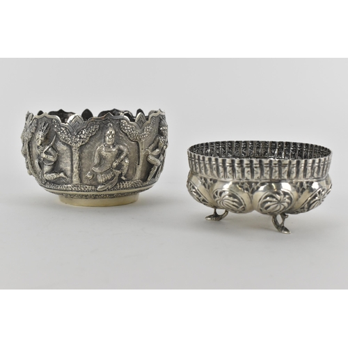 62 - Two early 20th century Indian silver bowls, the larger one decorated with panels of figures beneath ... 