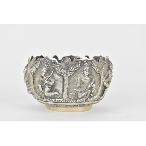 62 - Two early 20th century Indian silver bowls, the larger one decorated with panels of figures beneath ... 