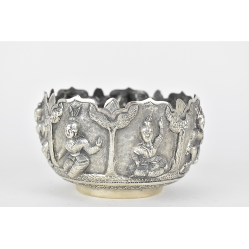 62 - Two early 20th century Indian silver bowls, the larger one decorated with panels of figures beneath ... 