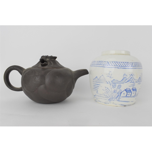 72 - A 20th century Chinese Yixing Zisha pottery teapot, marks to inside of the lid with an articulated d... 