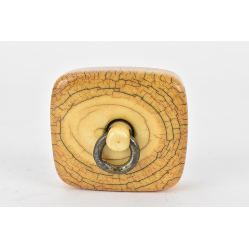 80 - A Japanese Edo period 18th/19th century, netsuke style ivory frog weight, with a metal ring, attache... 