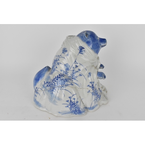 83 - An early 20th century Japanese blue and white incense burner in the form of a bear, decorated with f... 