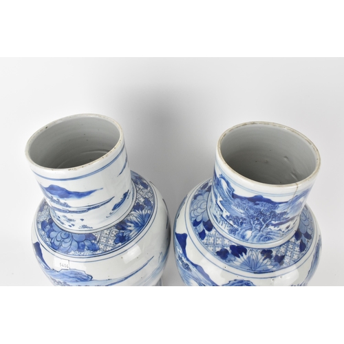 84 - A pair of Chinese Qing dynasty blue and white porcelain lidded vases, 19th century, of baluster shap... 