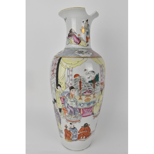 85 - A Chinese Qing dynasty famille rose vase, 18th century of ovoid shape with a flared rim, decorated w... 