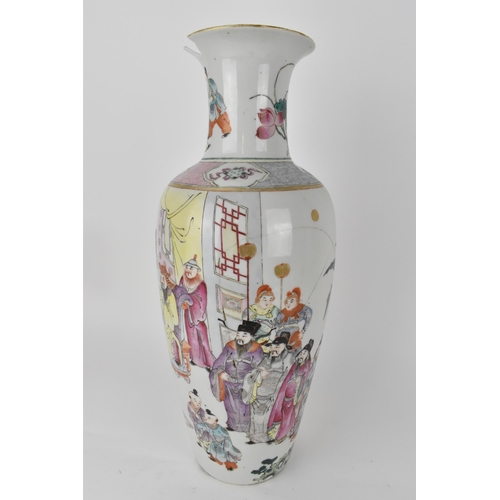 85 - A Chinese Qing dynasty famille rose vase, 18th century of ovoid shape with a flared rim, decorated w... 