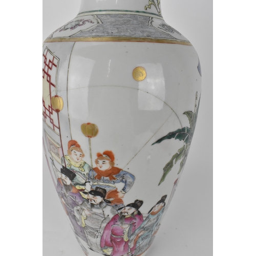 85 - A Chinese Qing dynasty famille rose vase, 18th century of ovoid shape with a flared rim, decorated w... 