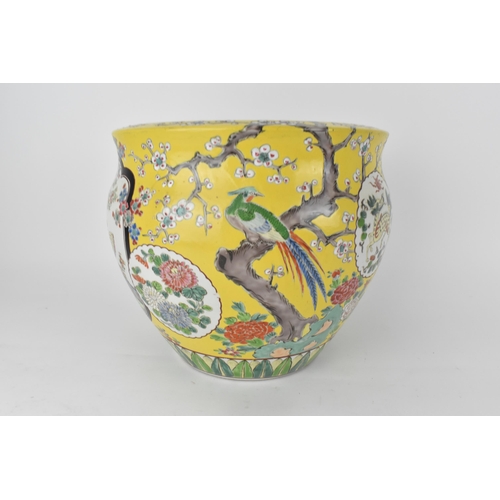 87 - A Chinese Qing dynasty 20th century jardiniere with two cartouches of woman with butterfly wings and... 