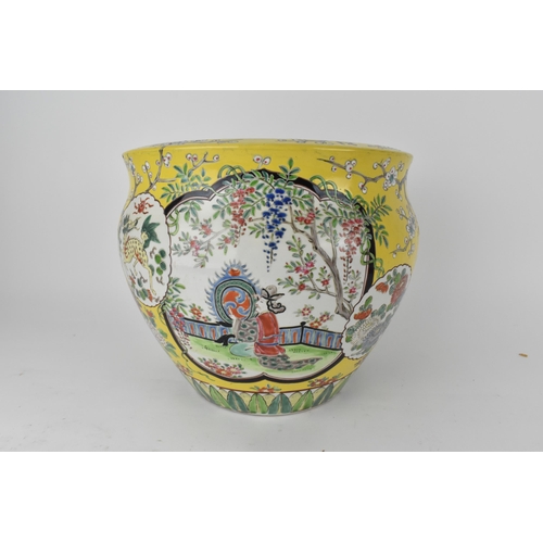 87 - A Chinese Qing dynasty 20th century jardiniere with two cartouches of woman with butterfly wings and... 