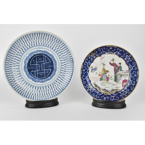 90 - Two Chinese dishes comprising of a 19th century blue and white dish with Shou to the centre, a ring ... 