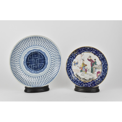 90 - Two Chinese dishes comprising of a 19th century blue and white dish with Shou to the centre, a ring ... 