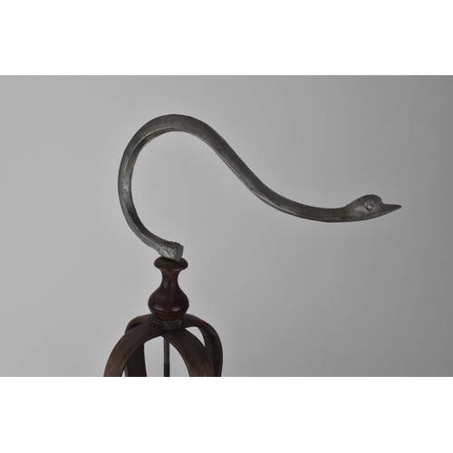 93 - A 20th century Chinese wooden and cane bird cage, with a metal swan neck hook and rising door on a p... 