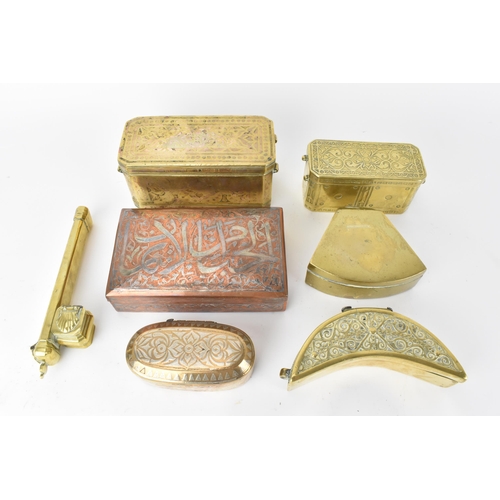 95 - Philippines and other brass betel nut boxes, a copper and white metal cigarette box, a brass fan sha... 