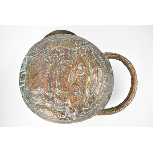 96 - A late 19th/early 20th century Tibetan incense burner, with turquoise cabochons, carrying handles an... 