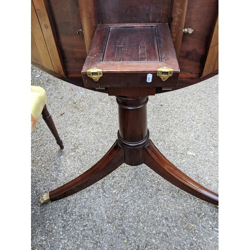 160 - A late 19th/early 20th century Regency design mahogany dining table with D-shaped ends, over cannon ... 