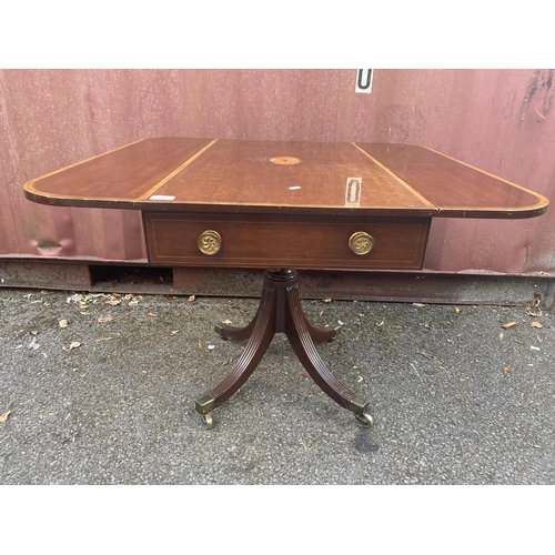 153 - A Regency mahogany and marquetry Pembroke table, the top with fall flaps and a crossbanded border, o... 