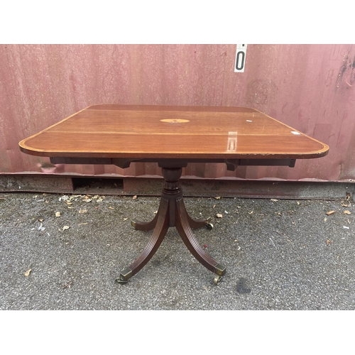 153 - A Regency mahogany and marquetry Pembroke table, the top with fall flaps and a crossbanded border, o... 