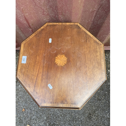 155 - A George III mahogany and marquetry octagonal cellaret, with a hinged lid enclosing a metal liner, b... 