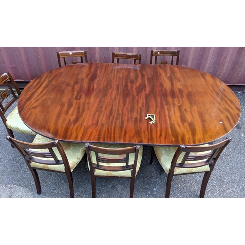 160 - A late 19th/early 20th century Regency design mahogany dining table with D-shaped ends, over cannon ... 