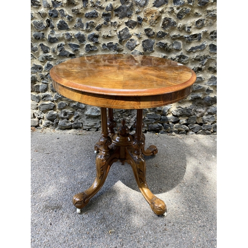 175 - A mid Victorian walnut and marquetry loo table, over turned, fluted columns, on carved splayed legs ... 