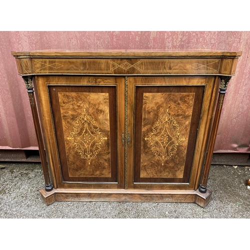 179 - A late Victorian figured walnut, mahogany cross-banded and marquetry cabinet, with turreted corners,... 